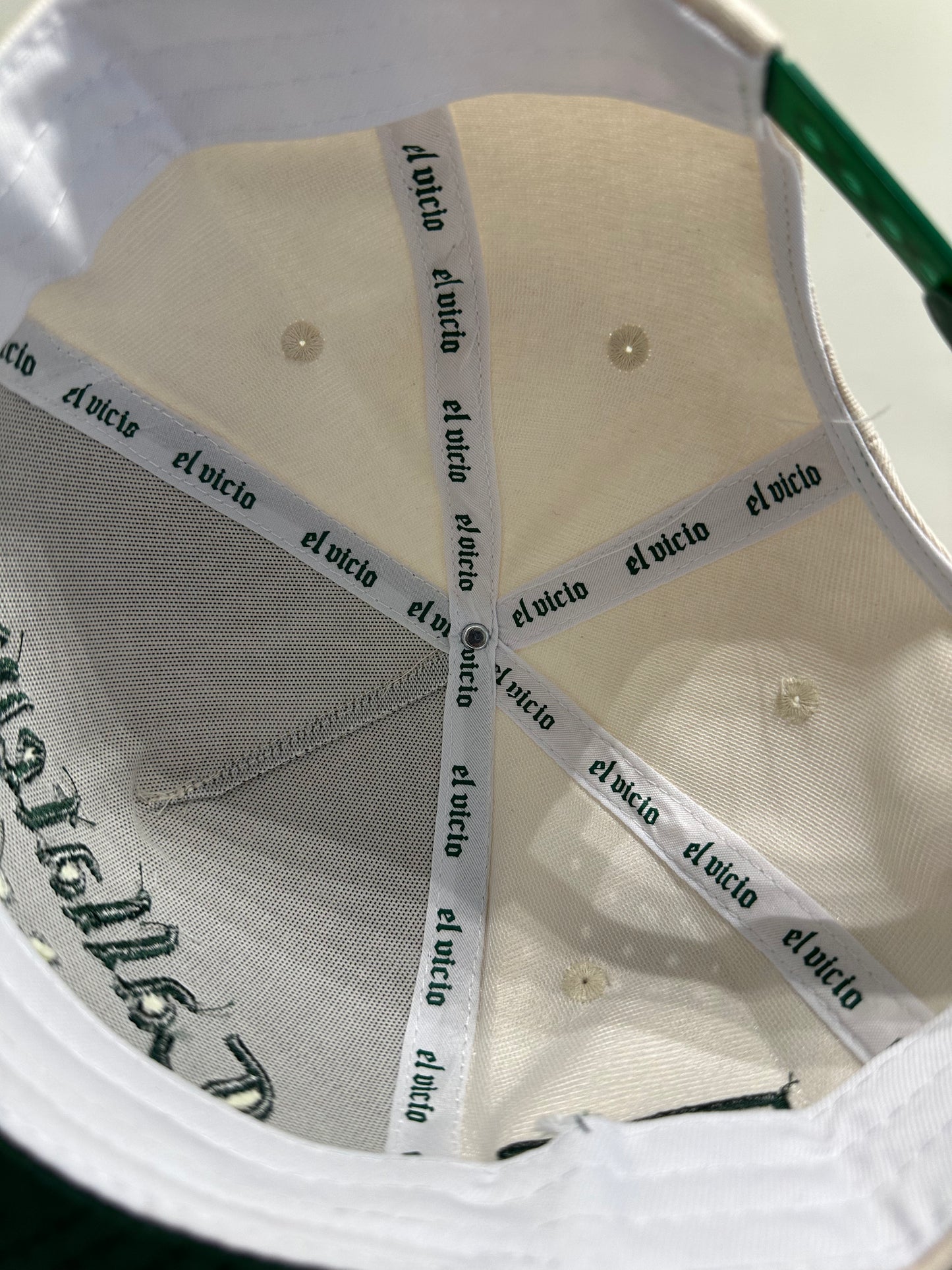 Cállatewey Golf Heritage Rope Hat – Cream/Forest Green with inside saying El vicio